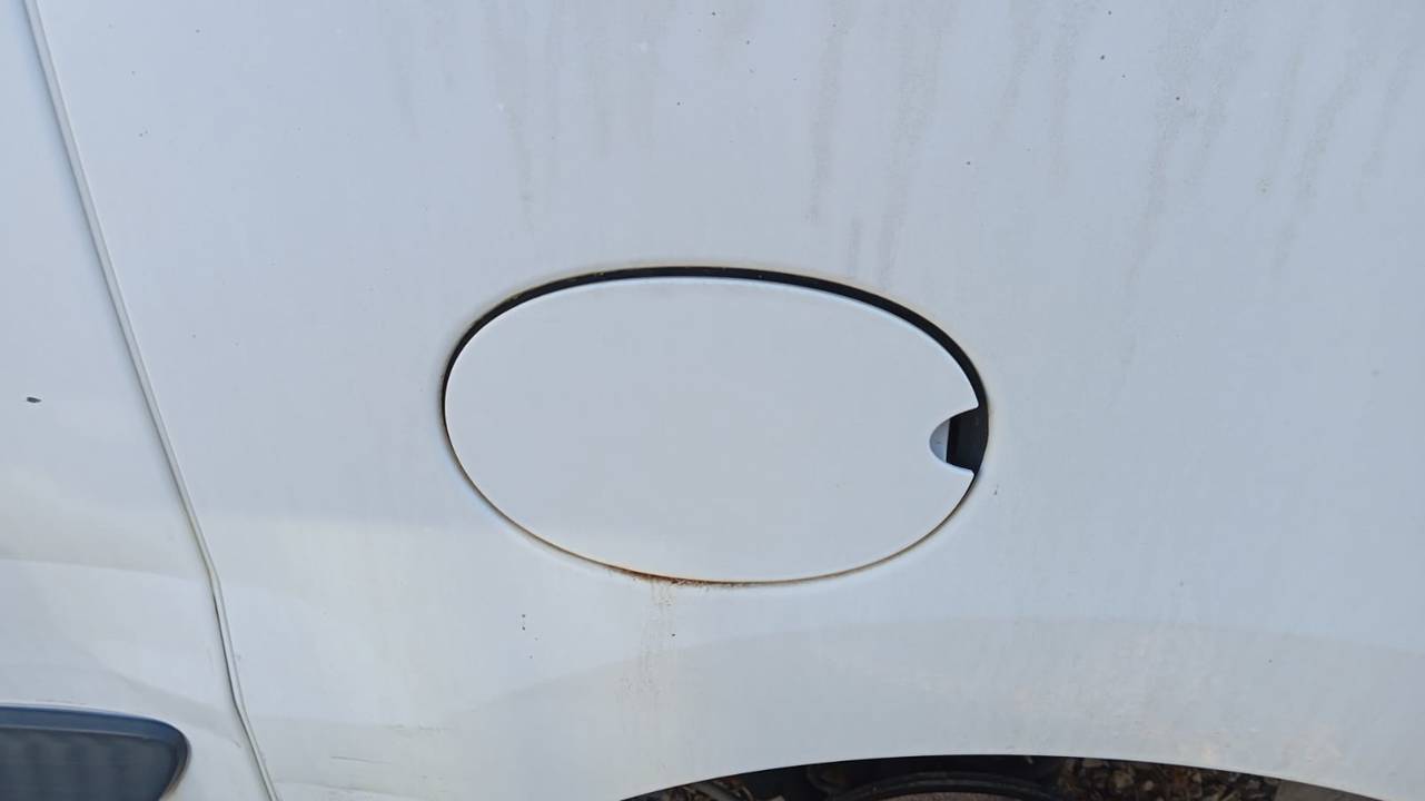 TAPA EXTERIOR COMBUSTIBLE
