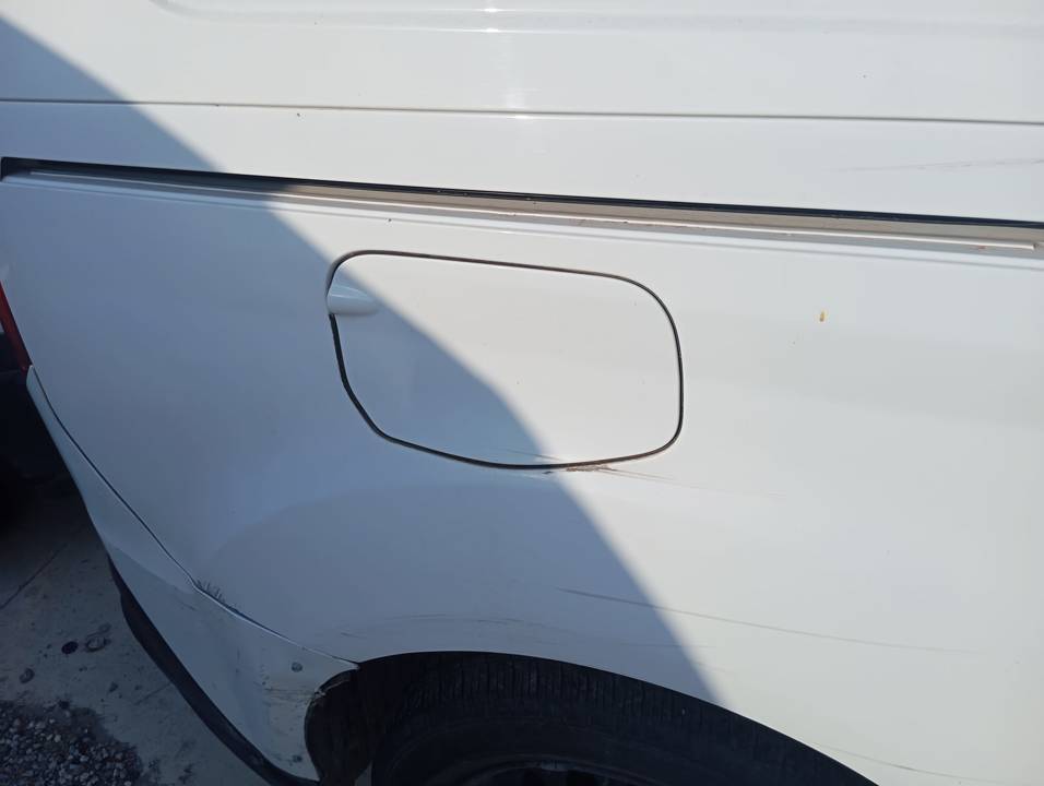 TAPA EXTERIOR COMBUSTIBLE