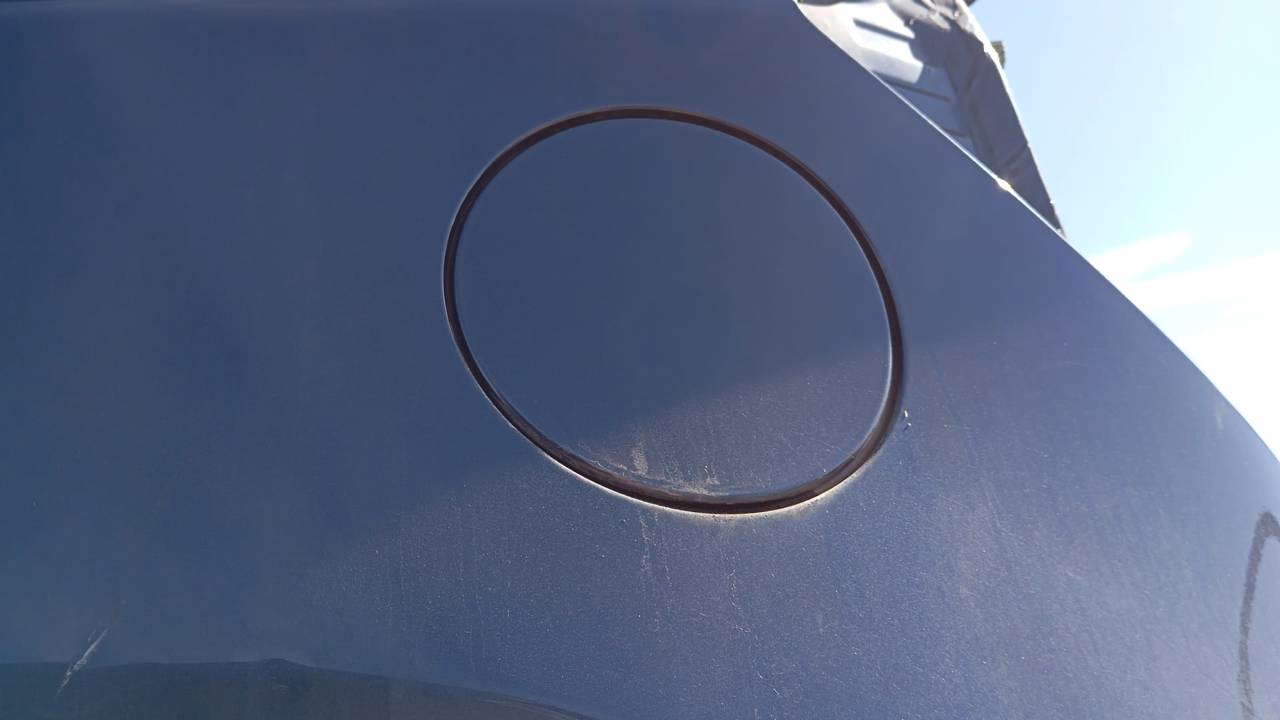TAPA EXTERIOR COMBUSTIBLE