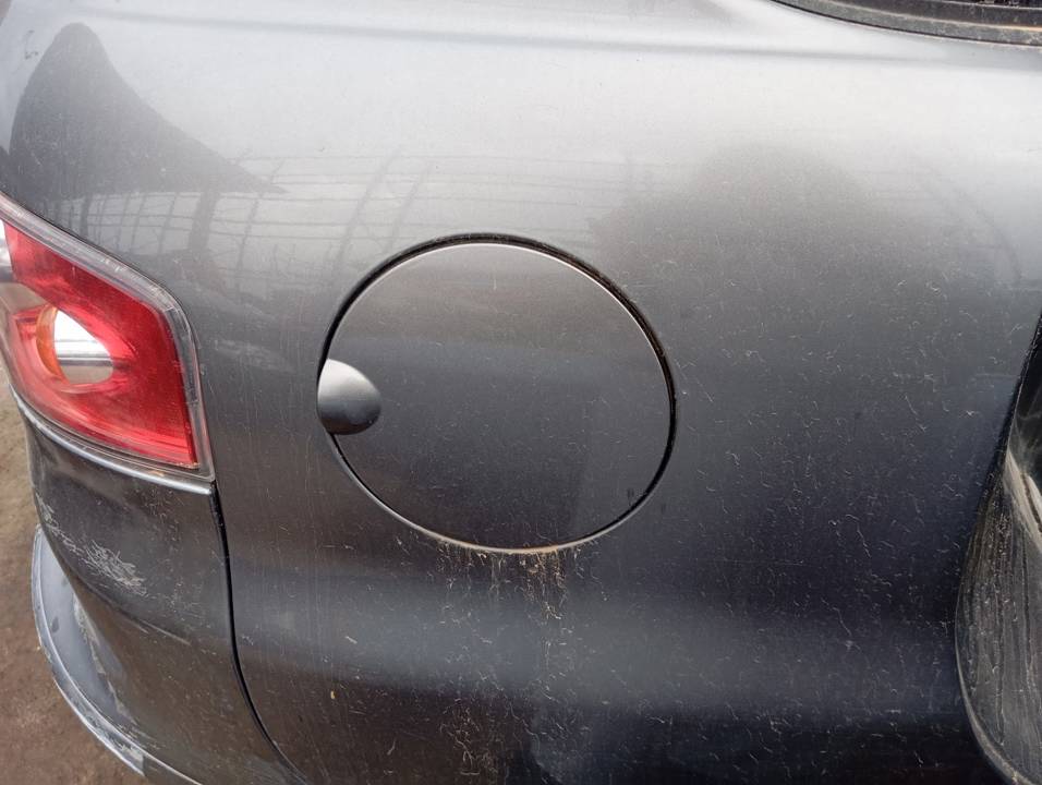 TAPA EXTERIOR COMBUSTIBLE