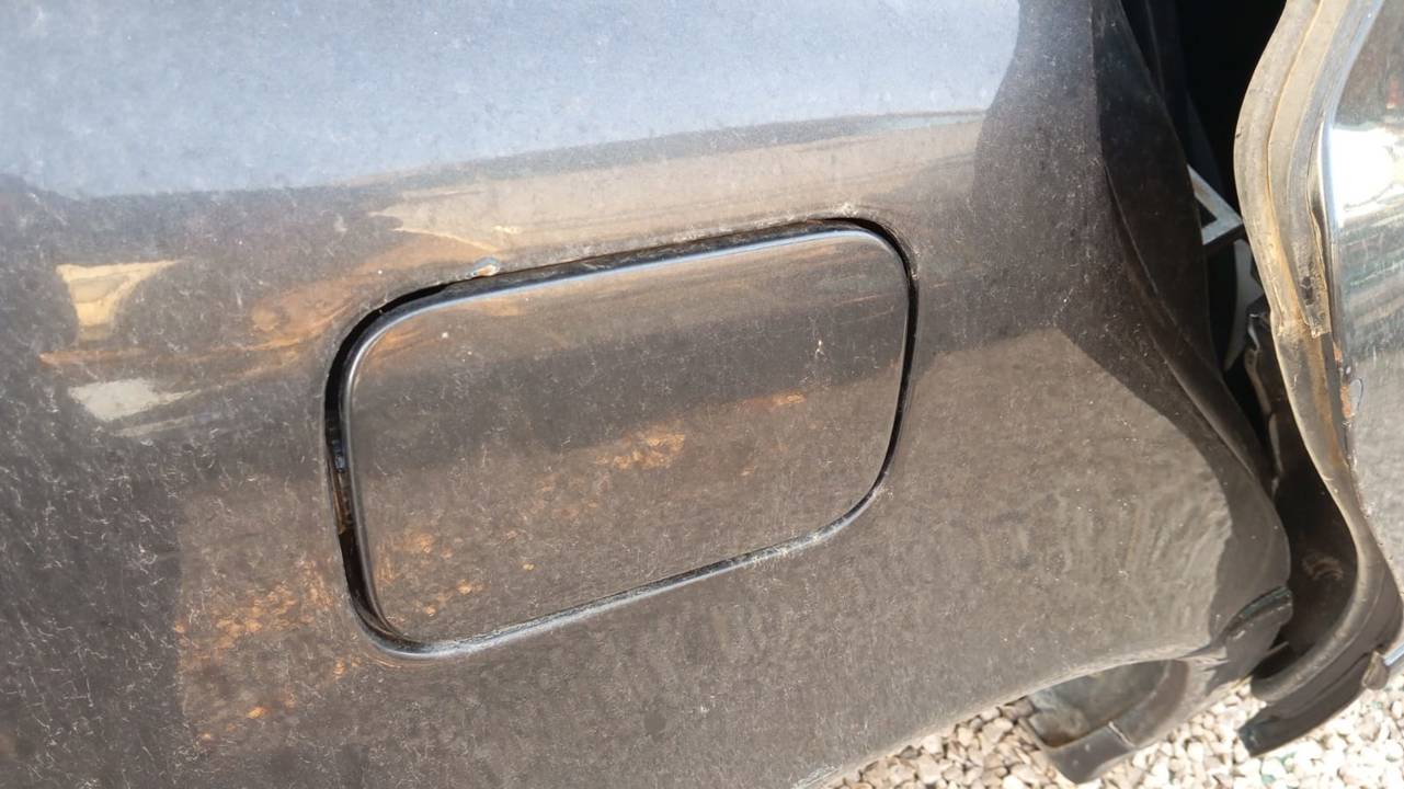 TAPA EXTERIOR COMBUSTIBLE