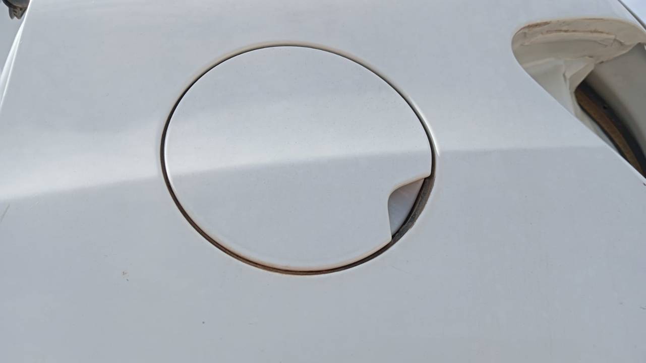TAPA EXTERIOR COMBUSTIBLE