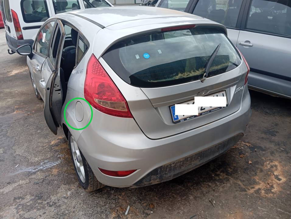 TAPA EXTERIOR COMBUSTIBLE