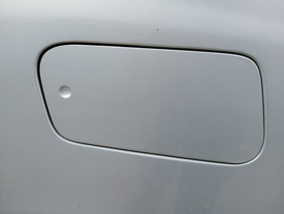 TAPA EXTERIOR COMBUSTIBLE