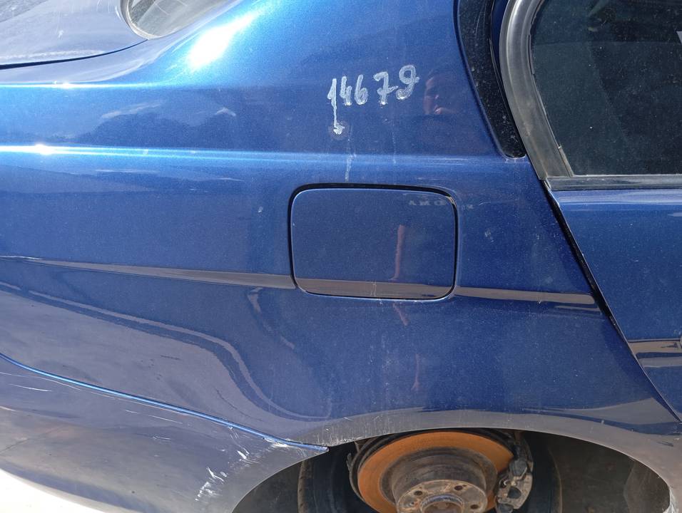 TAPA EXTERIOR COMBUSTIBLE