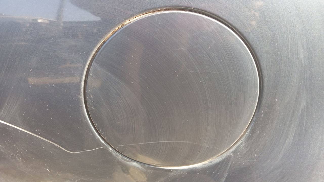TAPA EXTERIOR COMBUSTIBLE