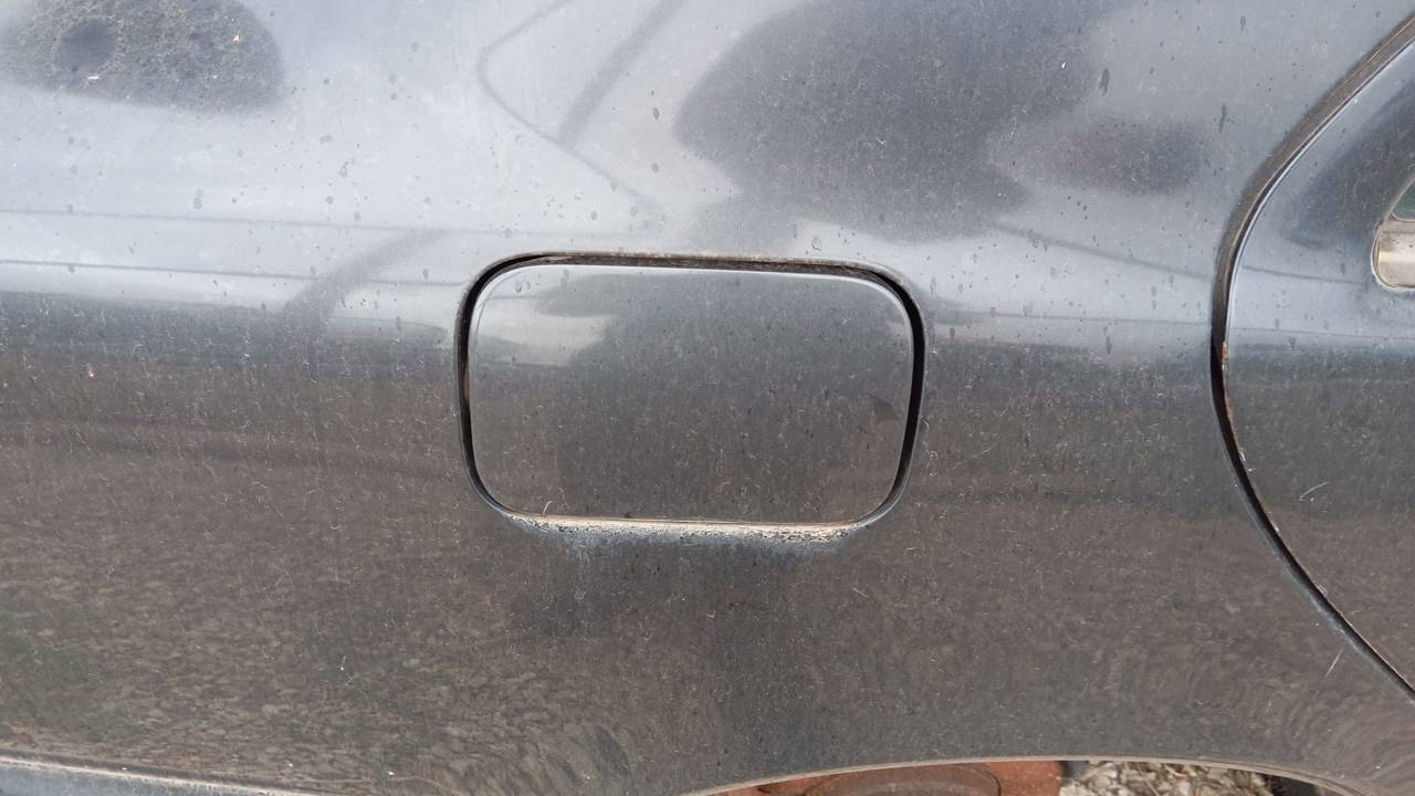 TAPA EXTERIOR COMBUSTIBLE
