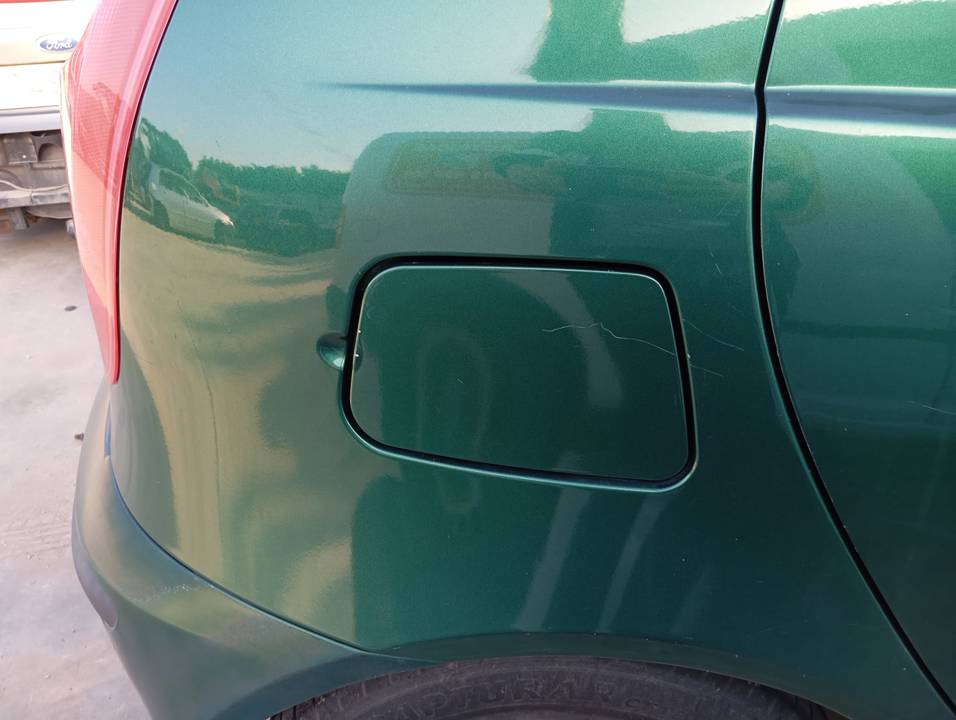 TAPA EXTERIOR COMBUSTIBLE