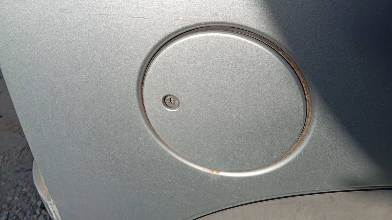 TAPA EXTERIOR COMBUSTIBLE