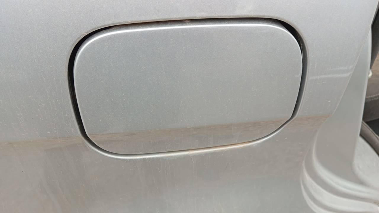 TAPA EXTERIOR COMBUSTIBLE