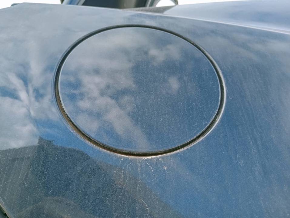 TAPA EXTERIOR COMBUSTIBLE