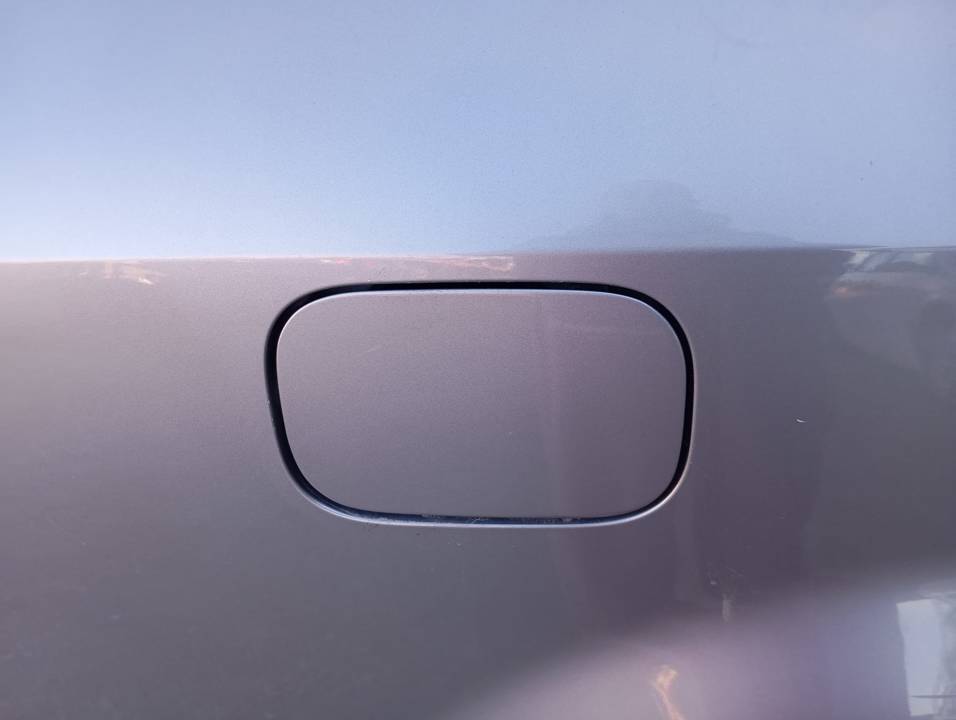 TAPA EXTERIOR COMBUSTIBLE