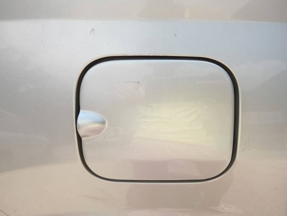 TAPA EXTERIOR COMBUSTIBLE