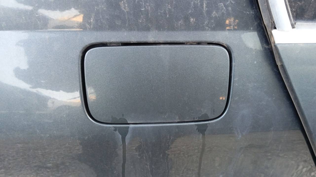 TAPA EXTERIOR COMBUSTIBLE