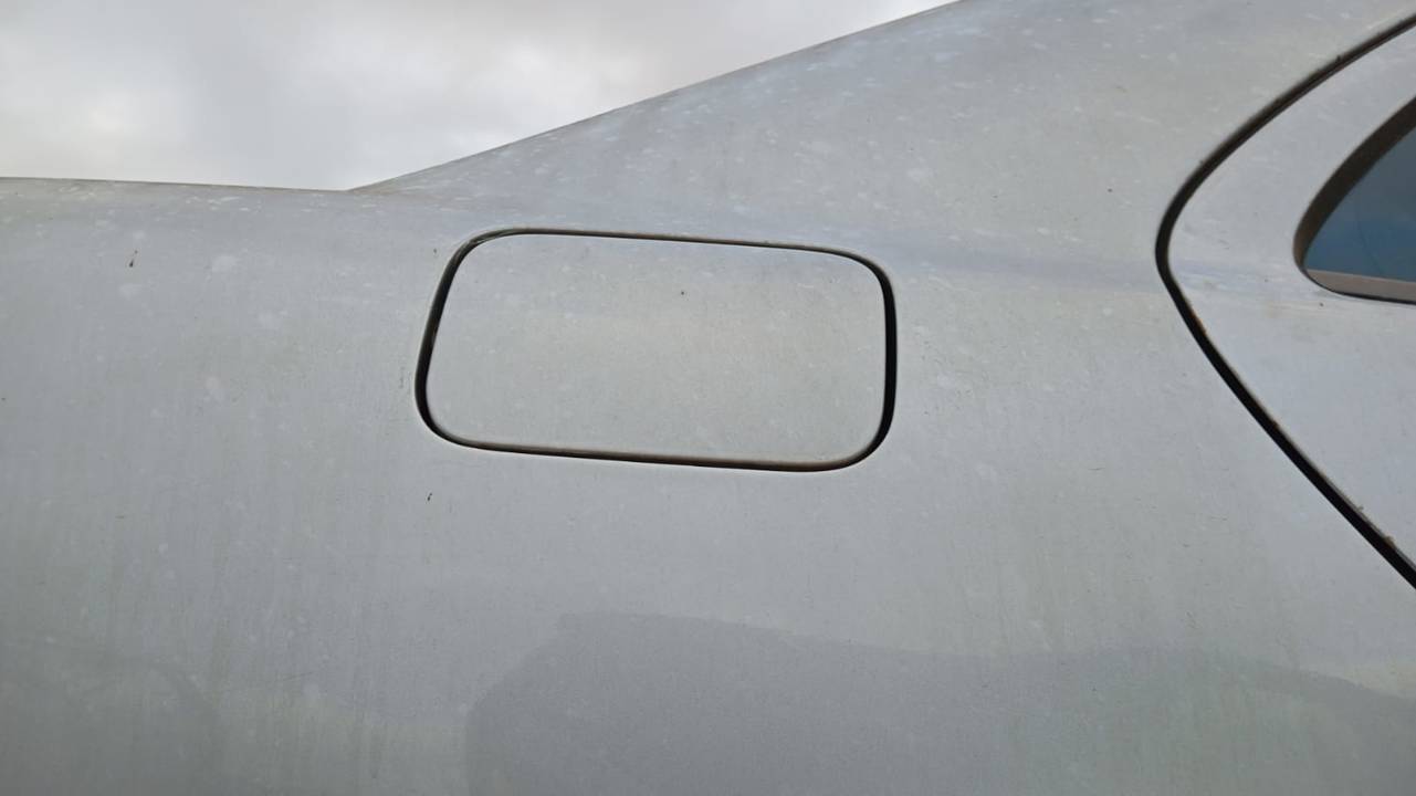 TAPA EXTERIOR COMBUSTIBLE
