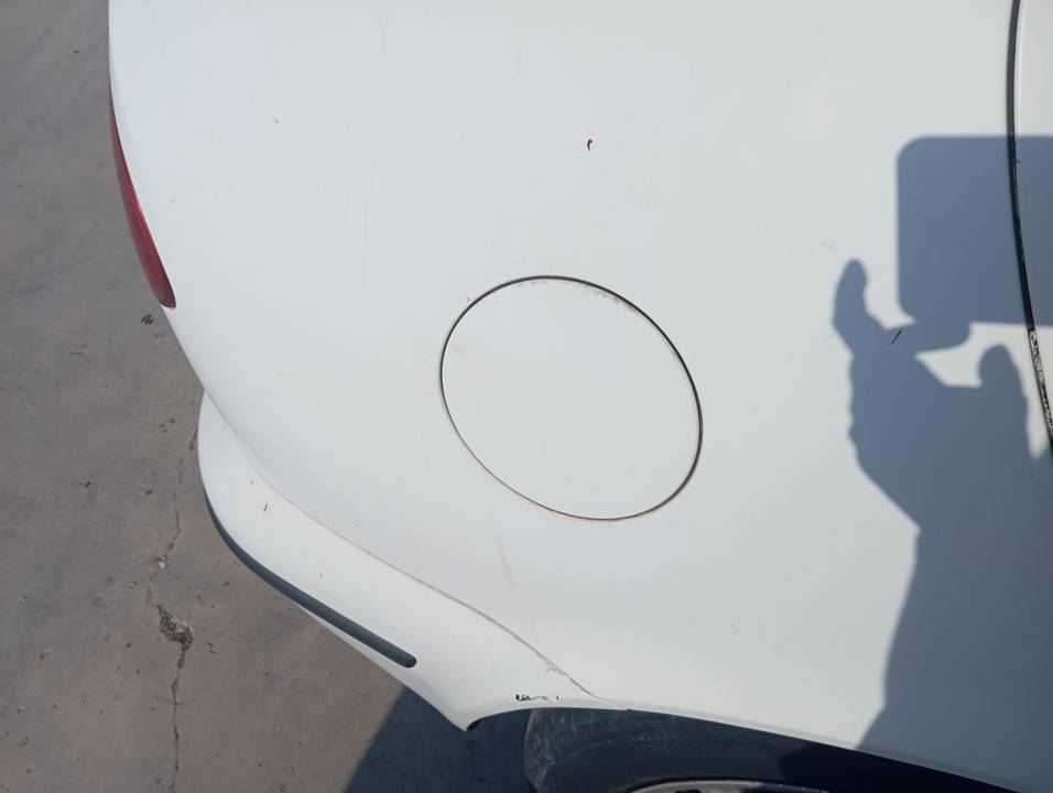 TAPA EXTERIOR COMBUSTIBLE