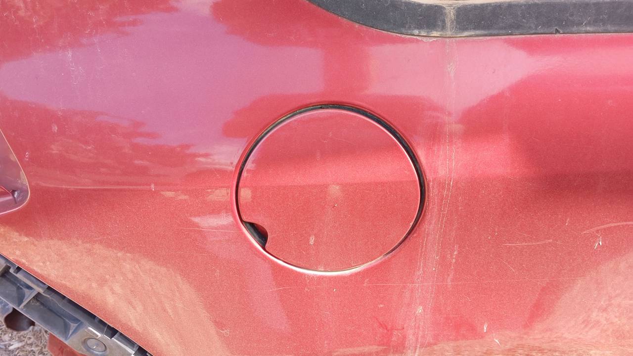 TAPA EXTERIOR COMBUSTIBLE
