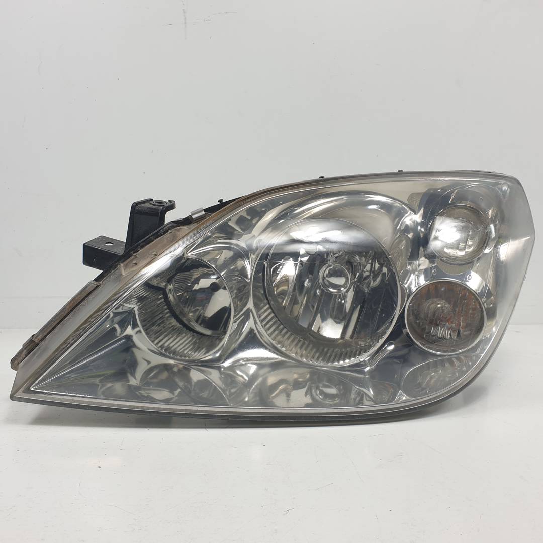 FARO IZQUIERDO - 26060AU800 - NISSAN - PRIMERA BERLINA (P12)