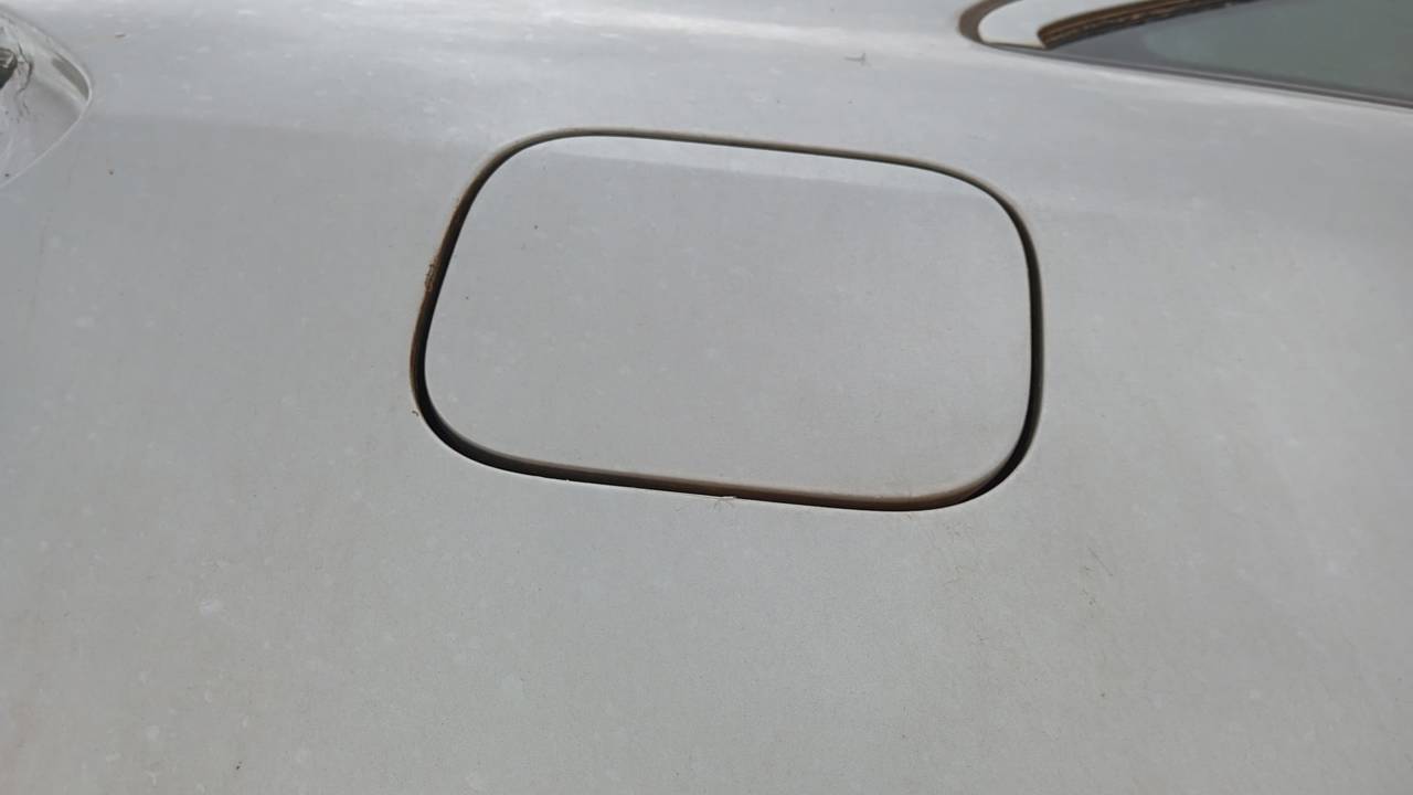 TAPA EXTERIOR COMBUSTIBLE