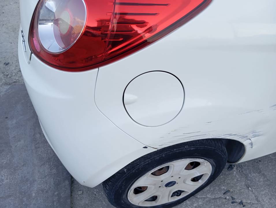 TAPA EXTERIOR COMBUSTIBLE