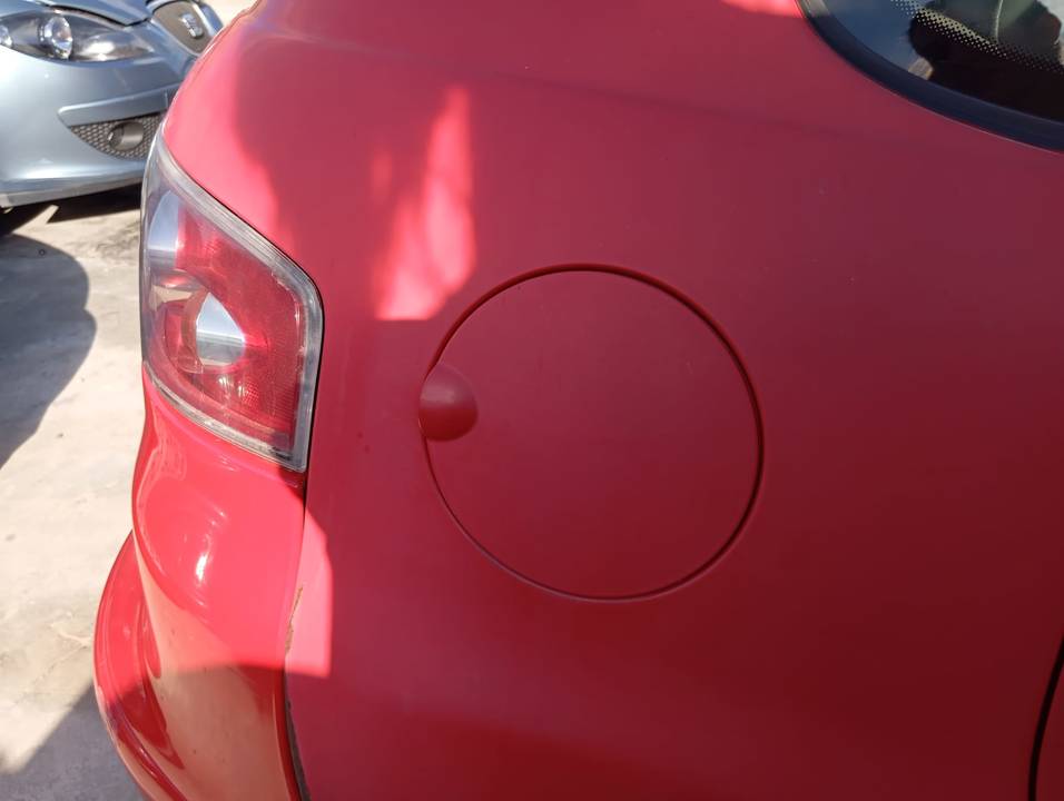 TAPA EXTERIOR COMBUSTIBLE