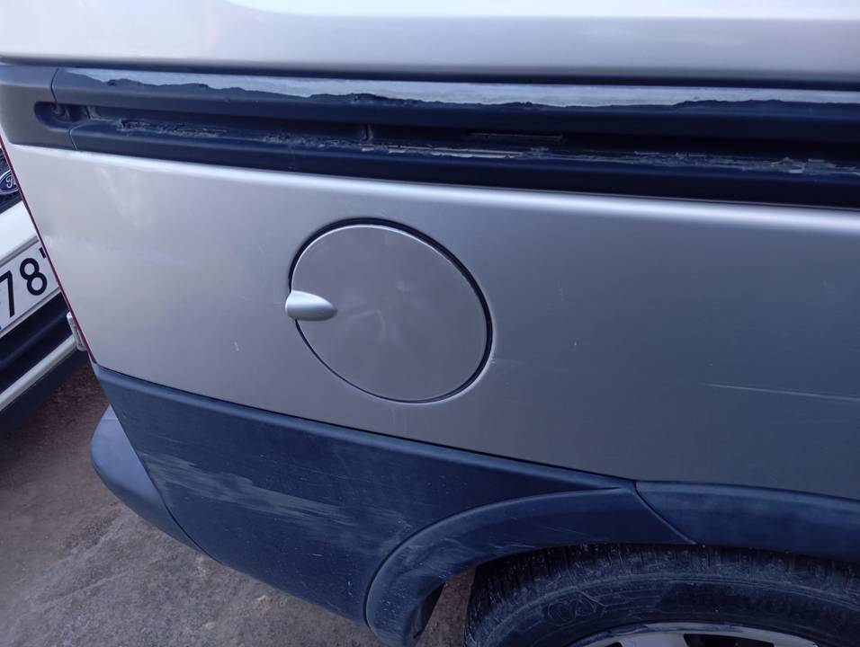 TAPA EXTERIOR COMBUSTIBLE