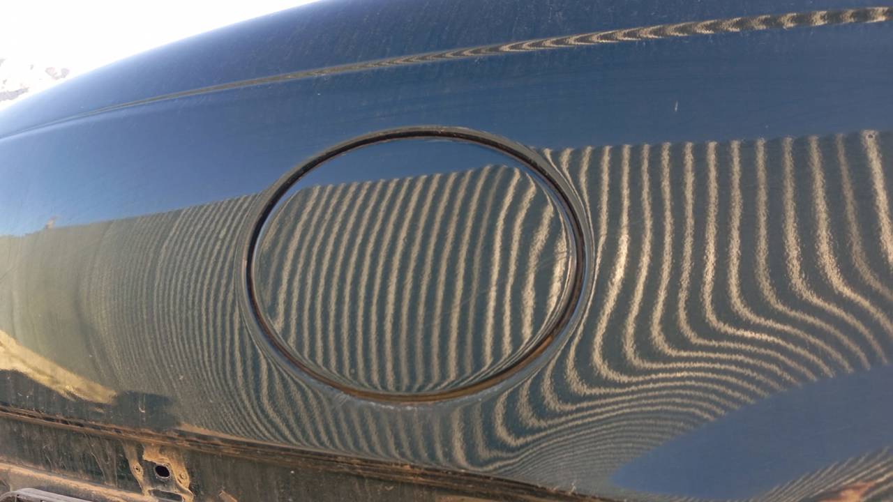 TAPA EXTERIOR COMBUSTIBLE