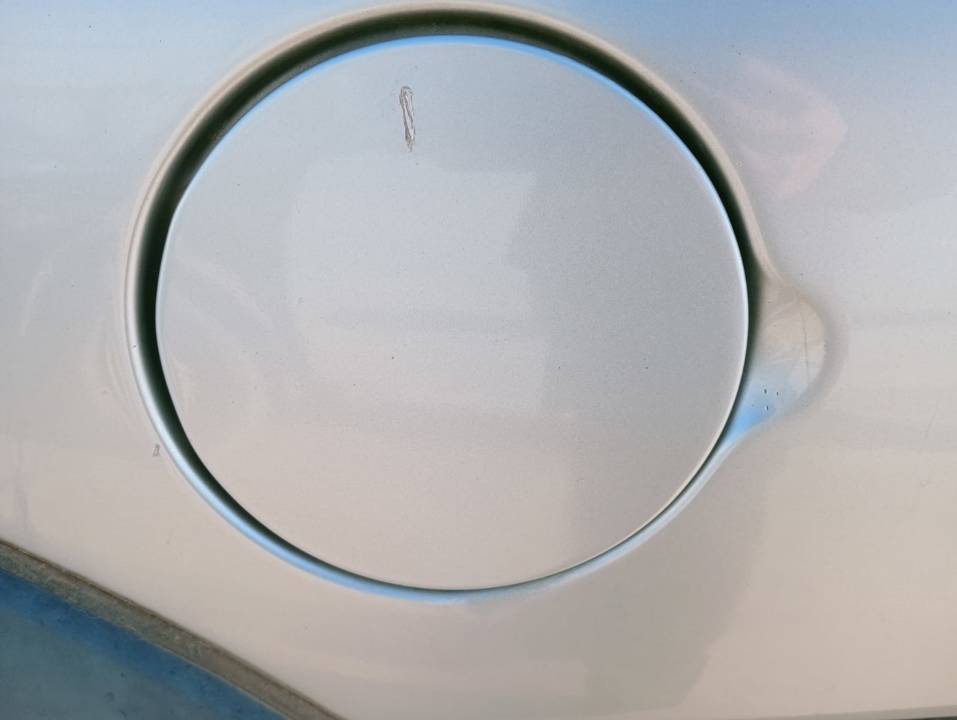 TAPA EXTERIOR COMBUSTIBLE