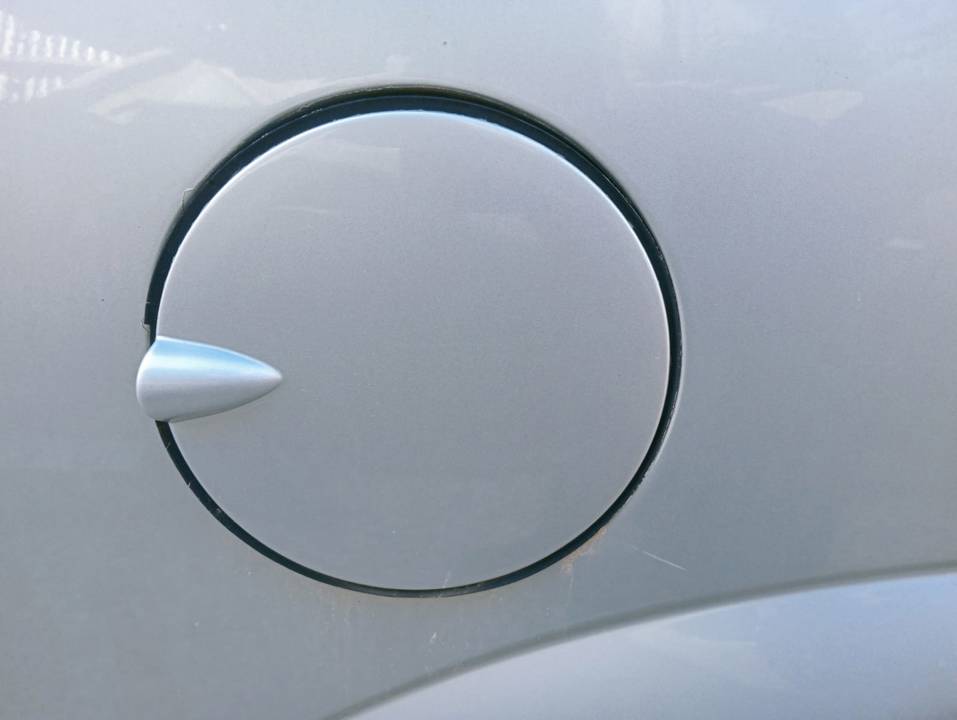 TAPA EXTERIOR COMBUSTIBLE