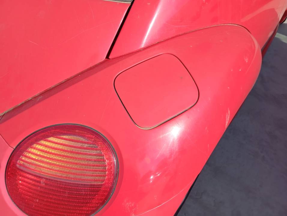 TAPA EXTERIOR COMBUSTIBLE