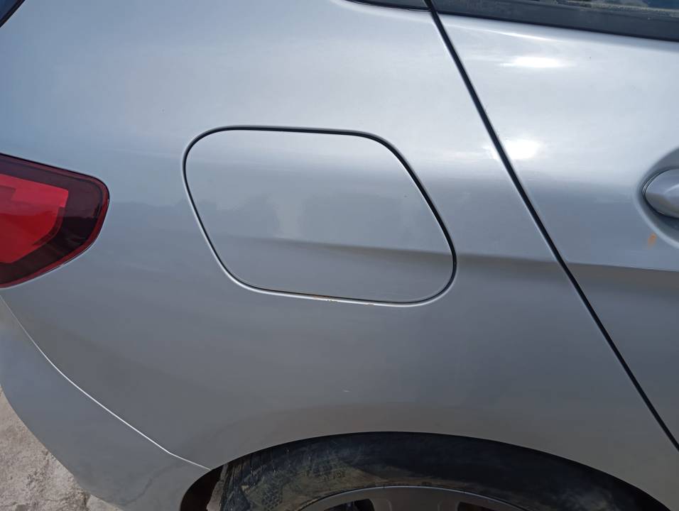 TAPA EXTERIOR COMBUSTIBLE