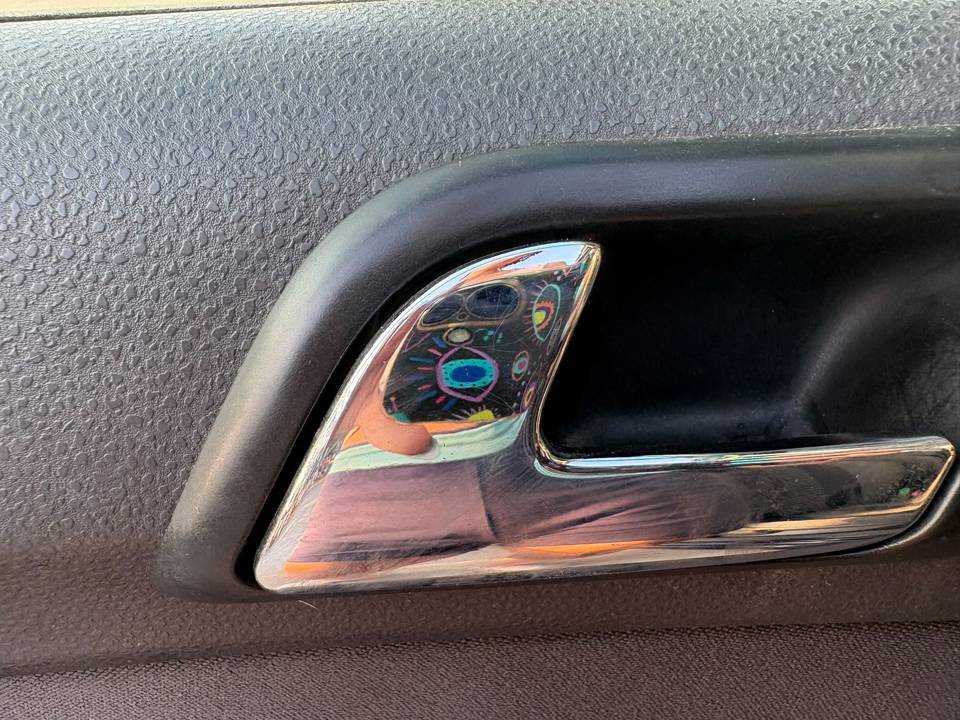 MANETA INTERIOR DELANTERA IZQUIERDA
