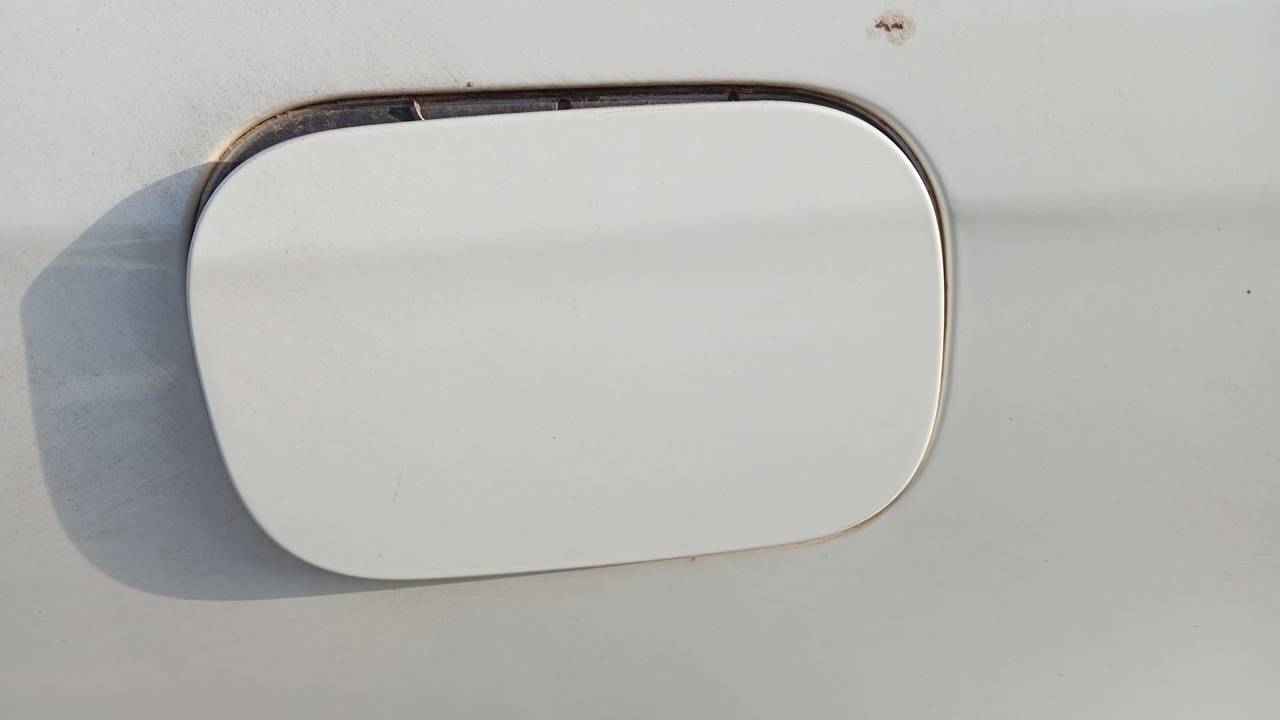 TAPA EXTERIOR COMBUSTIBLE