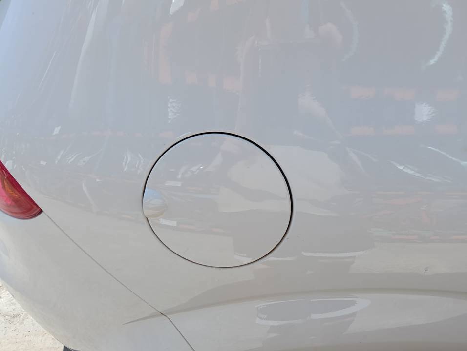 TAPA EXTERIOR COMBUSTIBLE