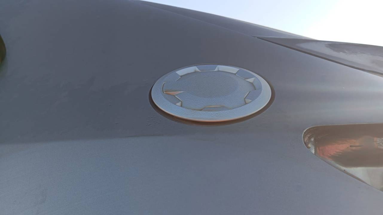 TAPA EXTERIOR COMBUSTIBLE