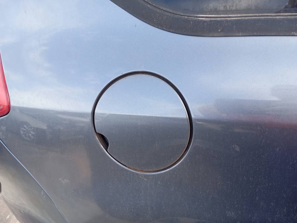 TAPA EXTERIOR COMBUSTIBLE