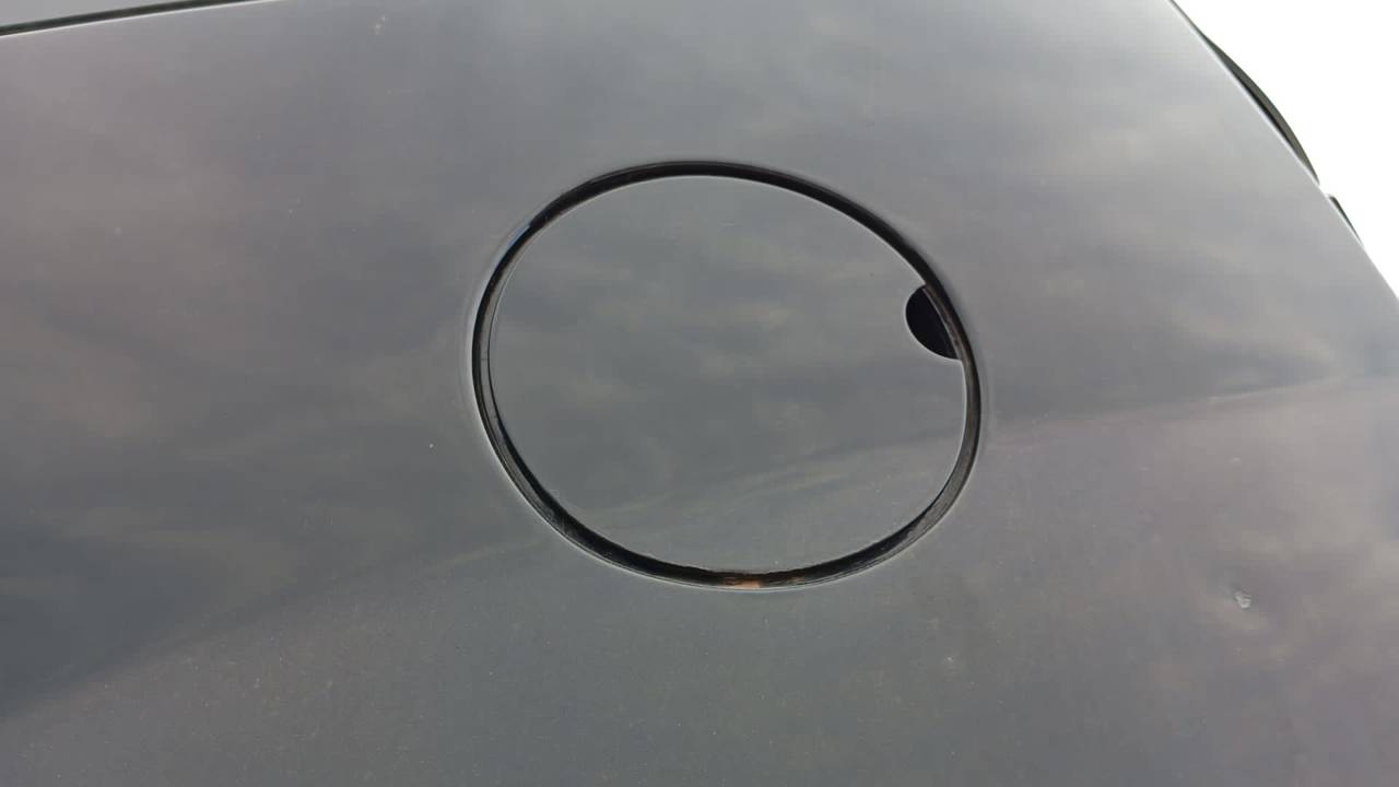 TAPA EXTERIOR COMBUSTIBLE