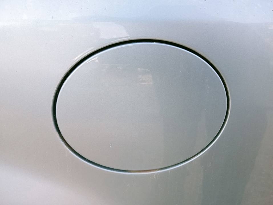 TAPA EXTERIOR COMBUSTIBLE