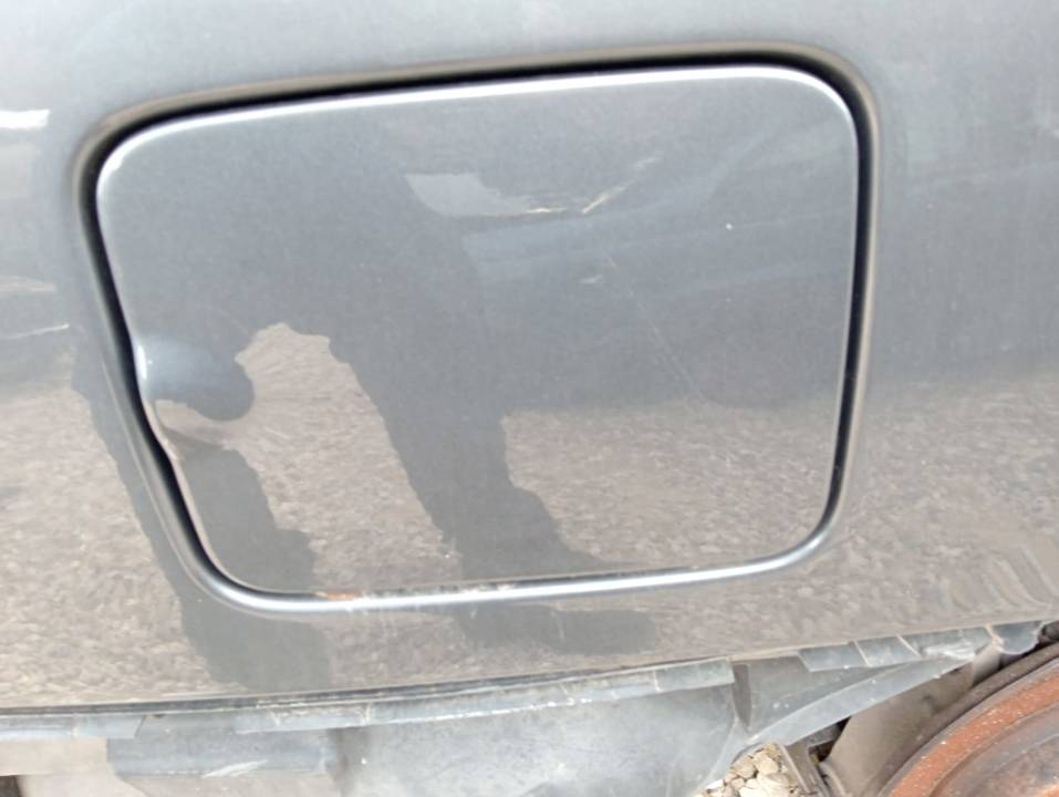 TAPA EXTERIOR COMBUSTIBLE