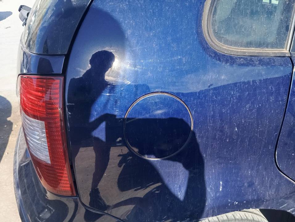 TAPA EXTERIOR COMBUSTIBLE