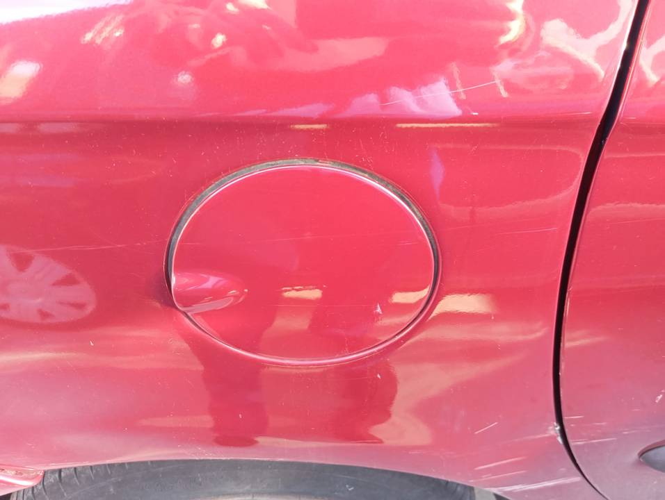 TAPA EXTERIOR COMBUSTIBLE