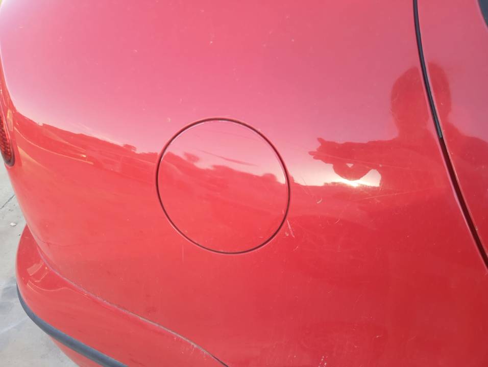TAPA EXTERIOR COMBUSTIBLE