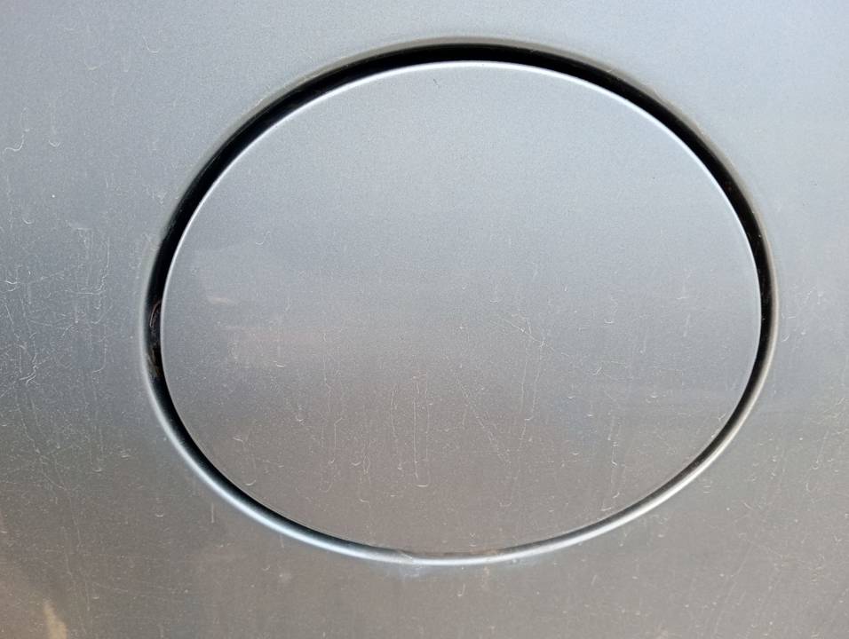 TAPA EXTERIOR COMBUSTIBLE