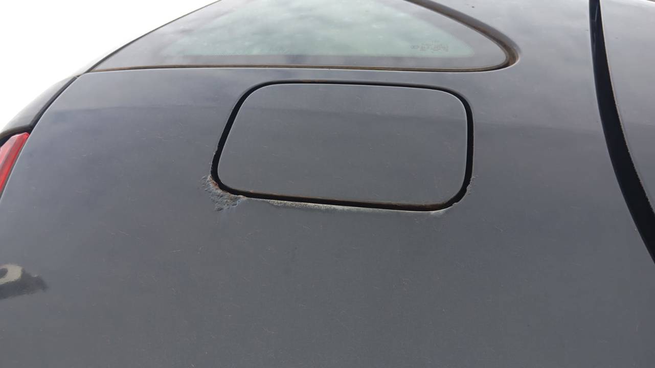 TAPA EXTERIOR COMBUSTIBLE