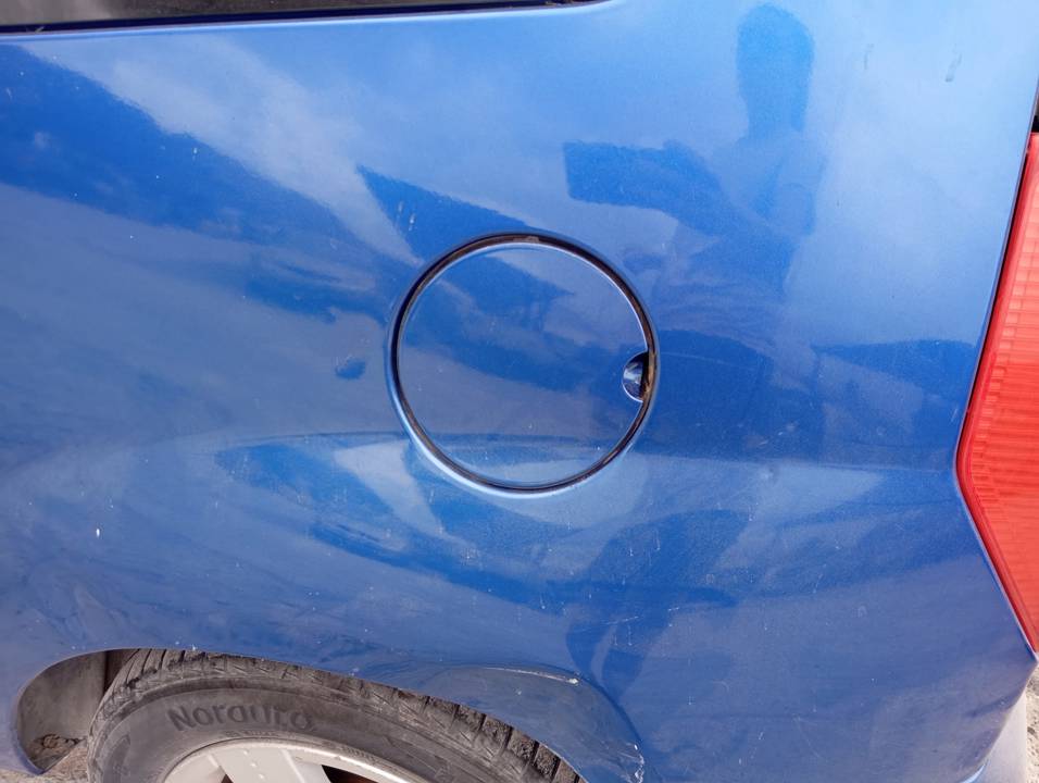 TAPA EXTERIOR COMBUSTIBLE