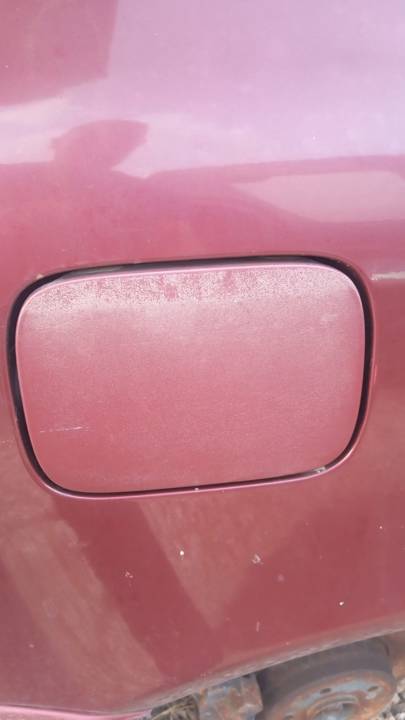 TAPA EXTERIOR COMBUSTIBLE