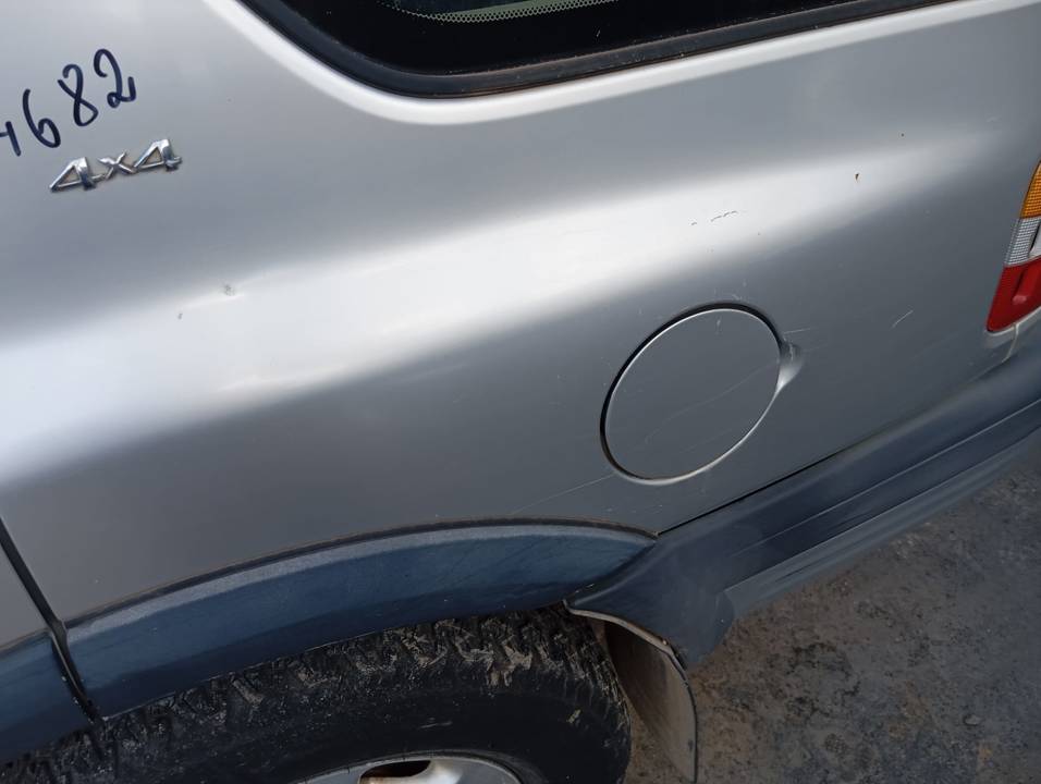 TAPA EXTERIOR COMBUSTIBLE