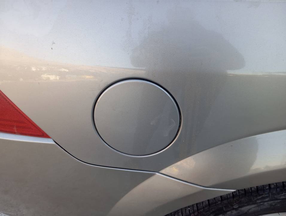 TAPA EXTERIOR COMBUSTIBLE