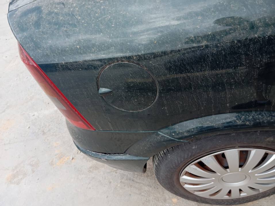TAPA EXTERIOR COMBUSTIBLE