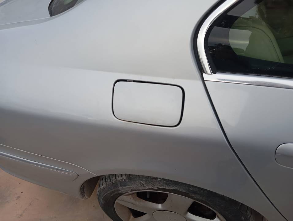 TAPA EXTERIOR COMBUSTIBLE